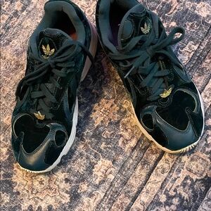 Adidas Dark Sneakers with Gold Accents